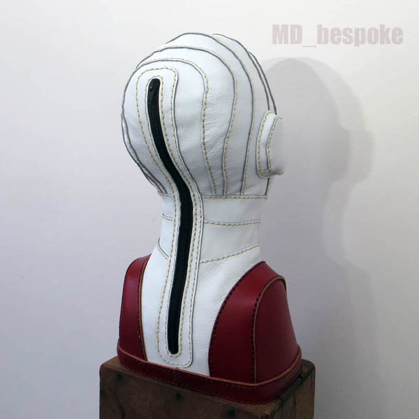 Mannequin head stand red and white leather zip